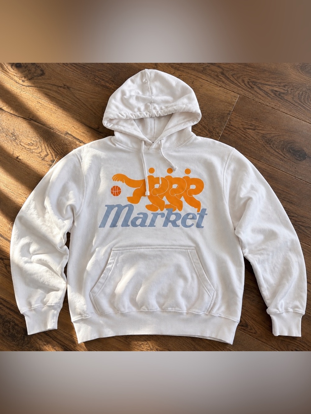 Market White Pullover Hoodie with Orange Graphic and Light Blue Logo Sz M NWT